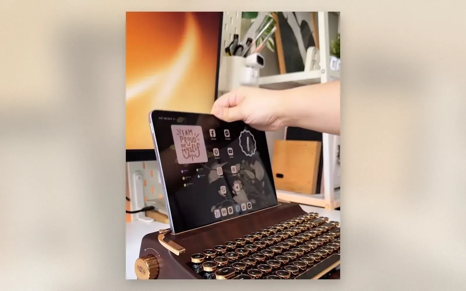 Retro typewriter keyboard with wood finish and tablet stand on a desk