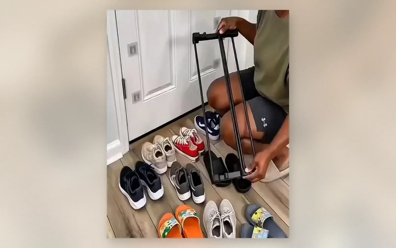Close-up of the rack loaded with shoes showing the angled storage