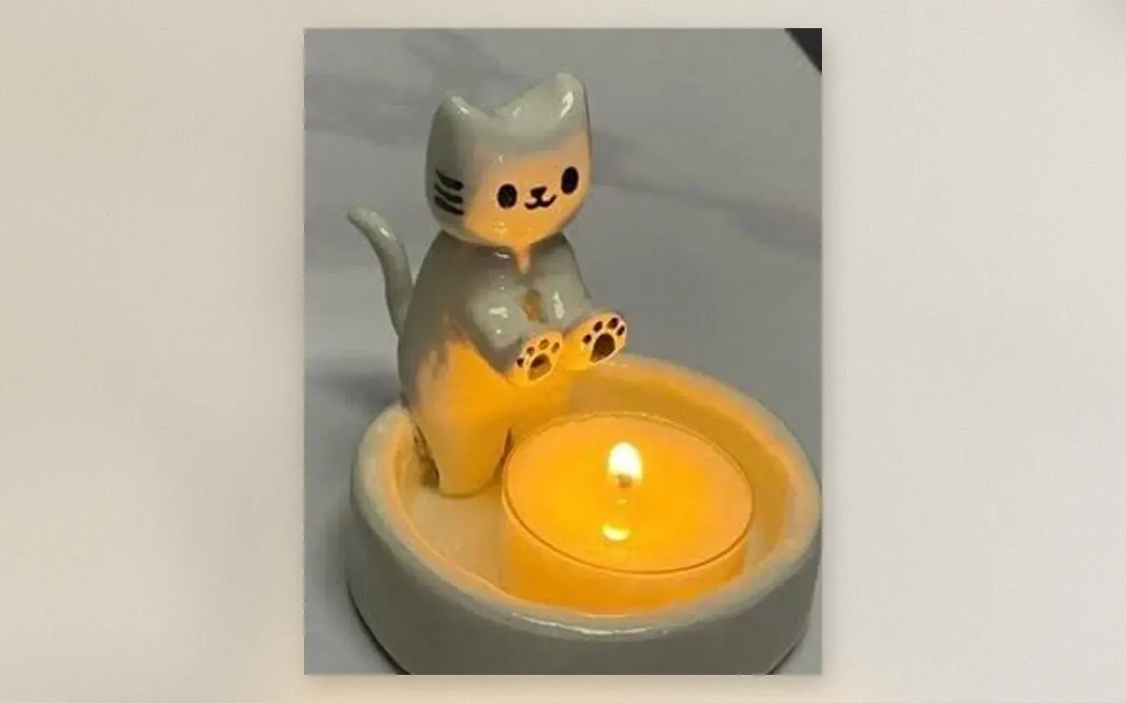 Ceramic cat candle holder — gray kitten sitting on tealight dish