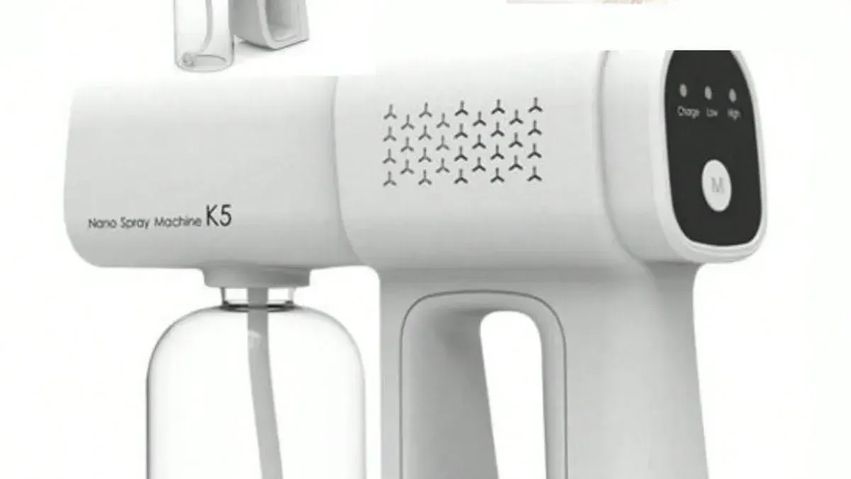 White K5 nano spray machine with digital display showing three spray modes and a clear bottle attached