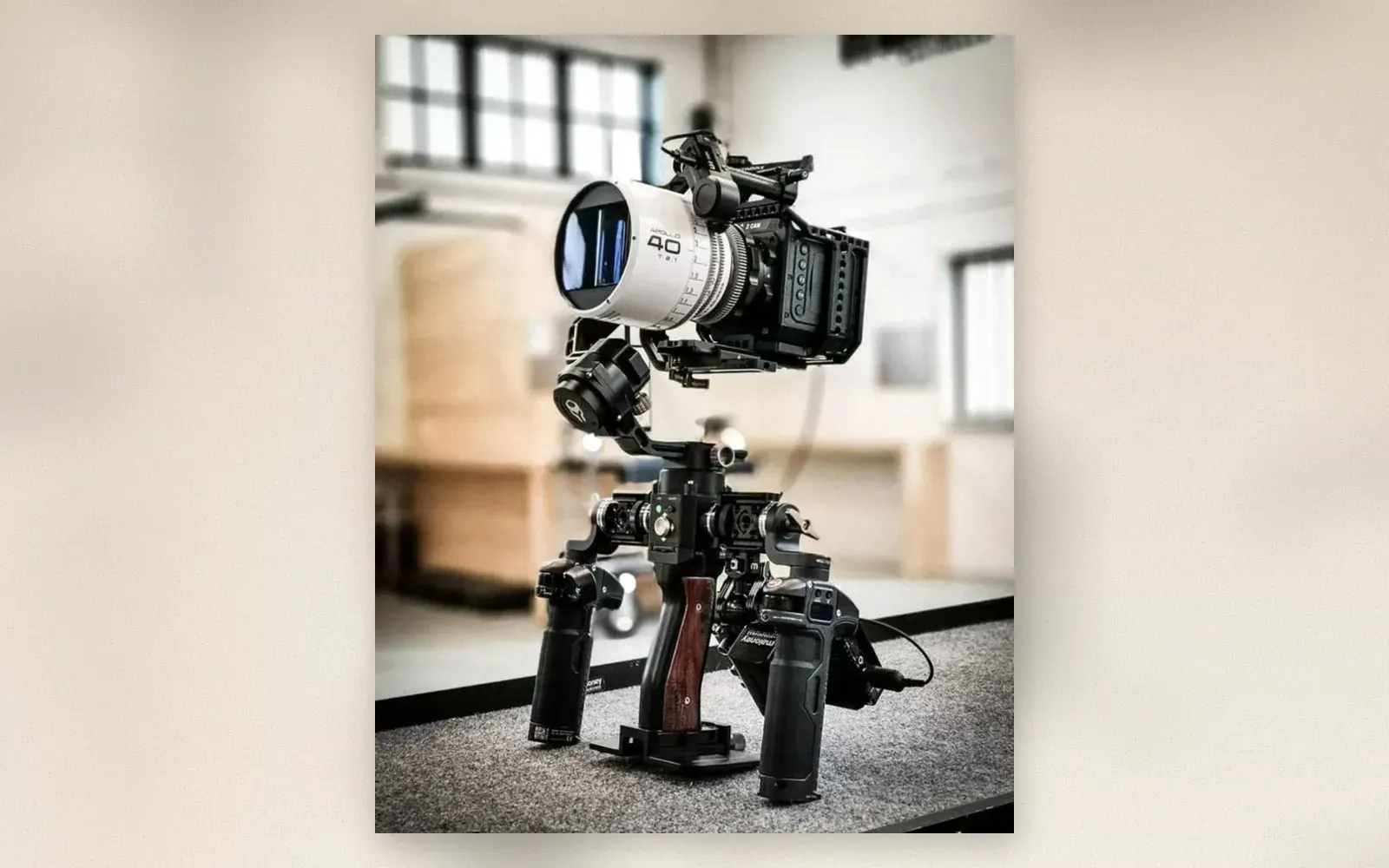 Cinema camera rig with Z CAM body, white Xelmus Apollo anamorphic lens, and dual-handle gimbal support
