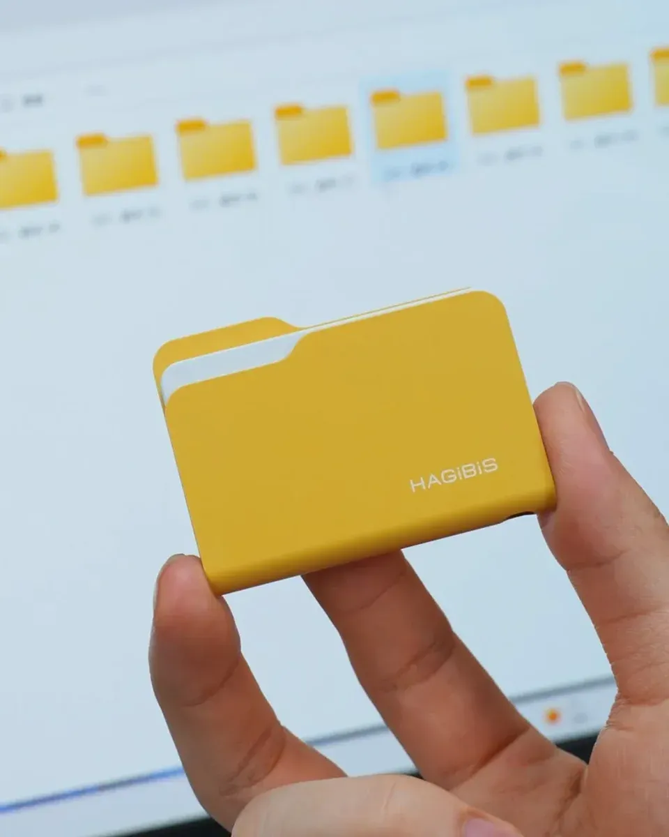 Hagibis folder-style SSD enclosure with its white paper accent and HAGiBiS branding