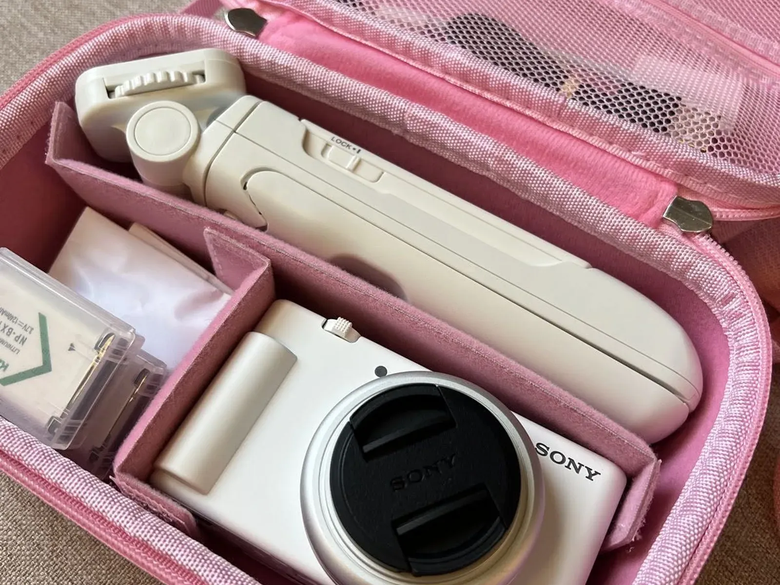 Close-up of the Sony ZV-1 II three-capsule microphone and flip-out touchscreen