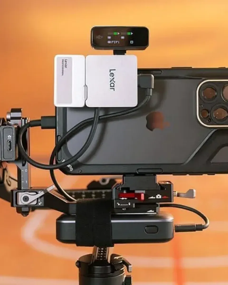 Rig detail showing SSD bracket, cables, and clamp system