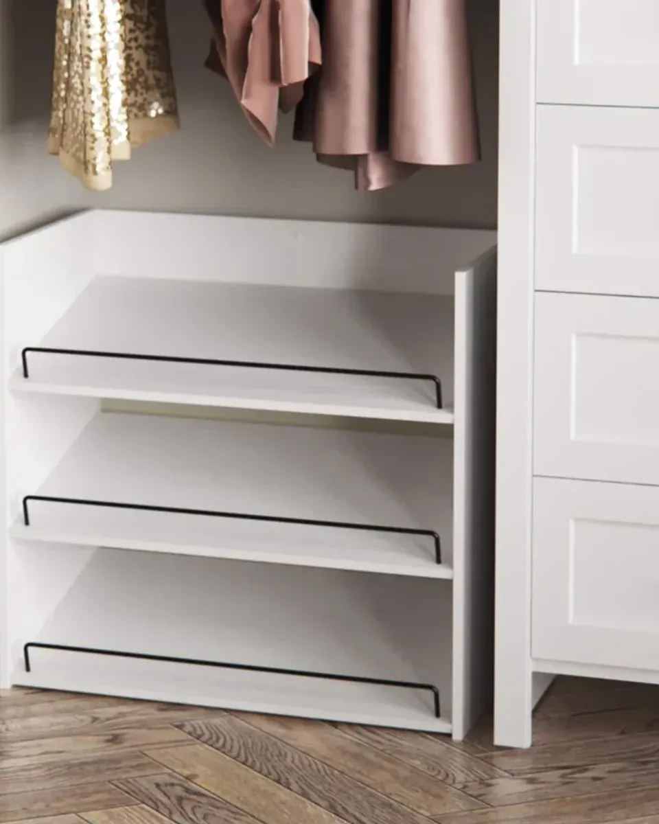 Close-up of the black metal rail guard on a white shelf