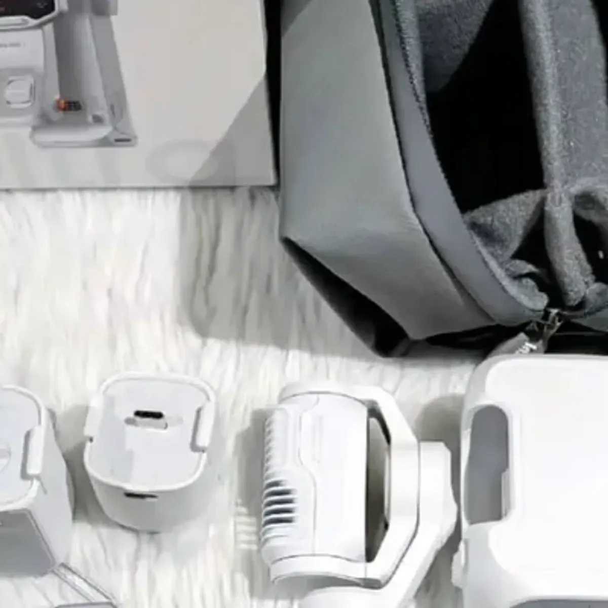 Insta360 Luna Ultra full kit contents spread on white surface
