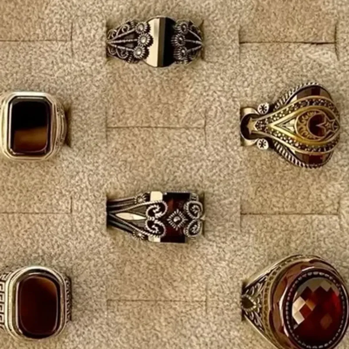 Rings worn on hand showing band width and stone presence