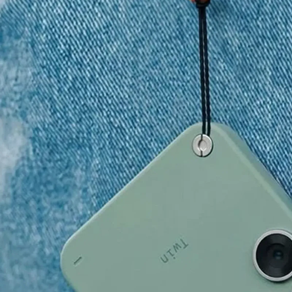Camera on carabiner clipped to belt loop