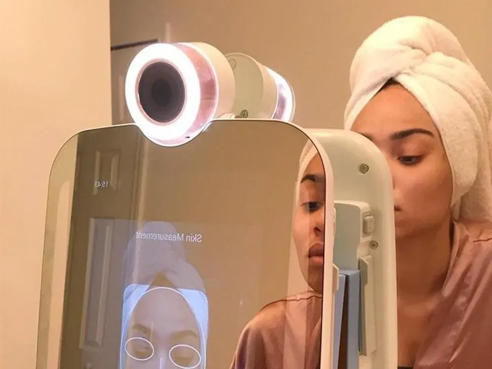 Closeup of the HiMirror Slide mirror surface during a morning skincare routine