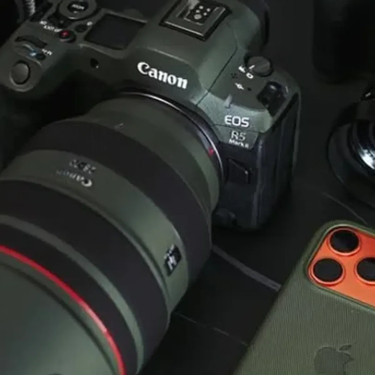 Cinema rig breakdown showing lens, monitor, and accessories