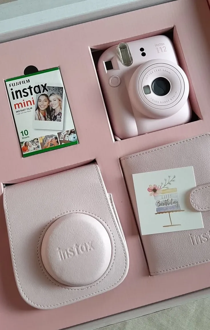 Fujifilm Instax Mini 12 Blossom Pink in the gift box with film pack and case