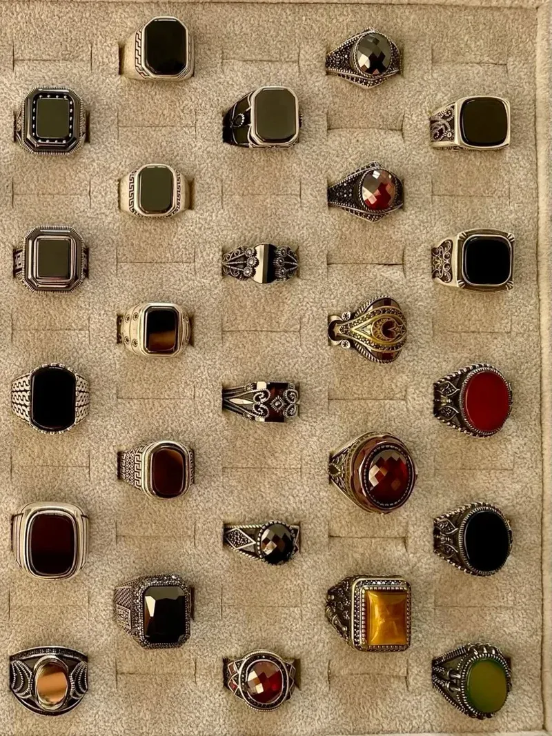 Tray of Ottoman signet rings showing onyx and amber stones