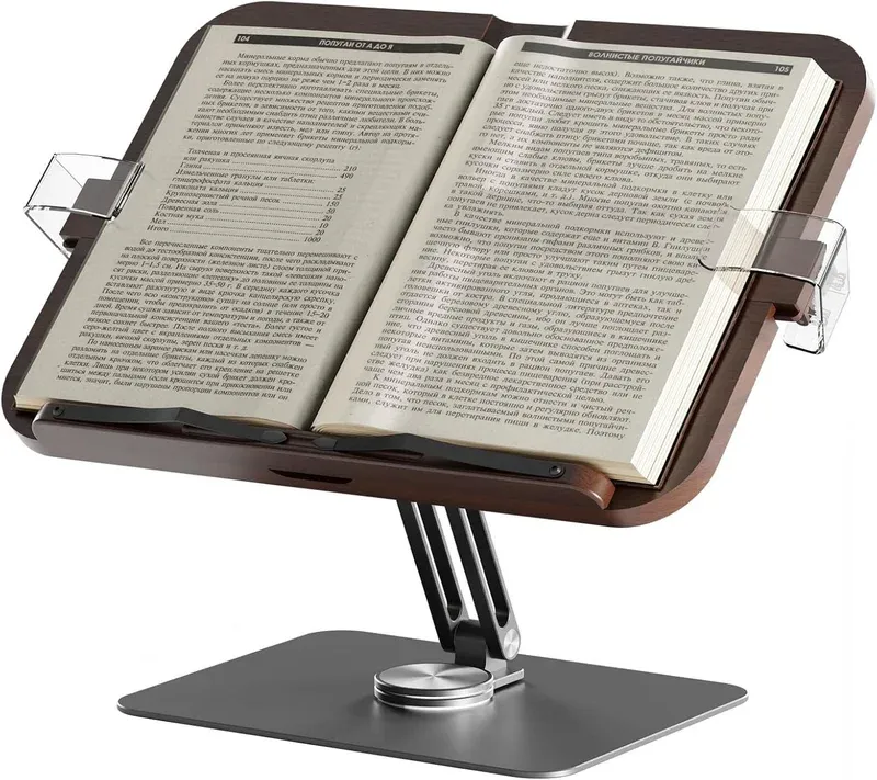 Adjustable book stand holding an open cookbook with clear clips