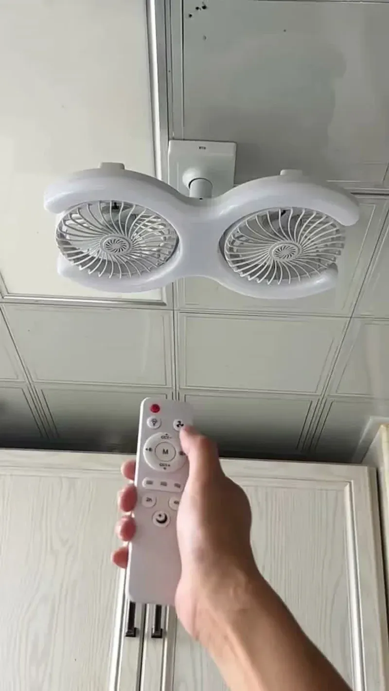 Dual-head ceiling fan showing both heads and the mounting bracket