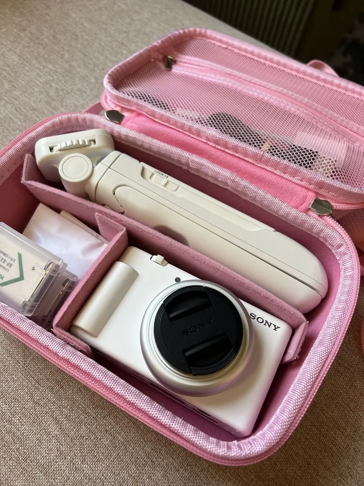 Sony ZV-1 II compact vlogging camera in white with the flip-out screen facing forward