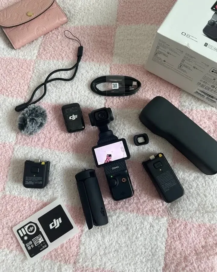 DJI Osmo Pocket 3 Creator Combo with all accessories laid out